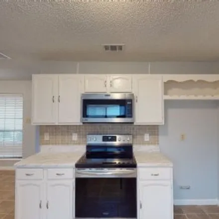 Buy this 3 bed apartment on 884 Bitternut Drive in Woodridge, Coppell