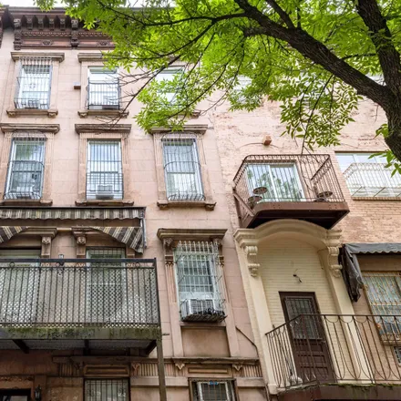 Buy this 8 bed townhouse on 146 Ross Street in New York, NY 11211
