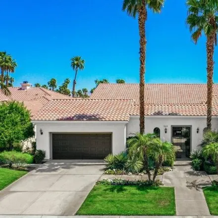 Rent this 4 bed house on 56714 Muirfield Village in La Quinta, CA 92253