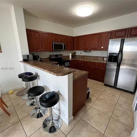 Rent this 4 bed apartment on 9135 Southwest 93rd Path in Cutler Bay, FL 33190
