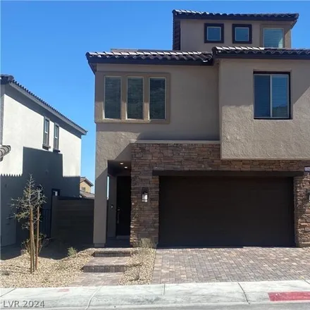 Rent this 4 bed house on Desert Hollow Avenue in Las Vegas, NV 89144