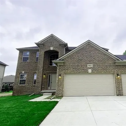 Buy this 4 bed house on 49412 Appaloosa Drive in Macomb Township, MI 48042