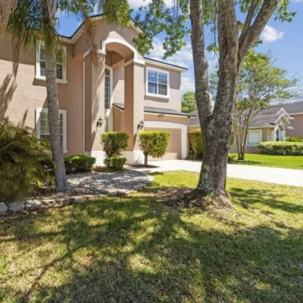 Buy this 5 bed house on 11703 Magnolia Falls Drive in Jacksonville, FL 32258