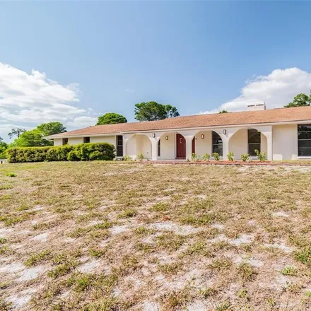 Rent this 4 bed house on 7818 Sycamore Drive in Jasmine Estates, FL 34654