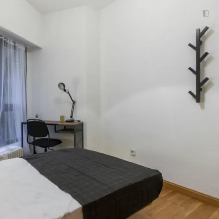 Rent this 5 bed room on Calle de Cáceres in 6, 28045 Madrid
