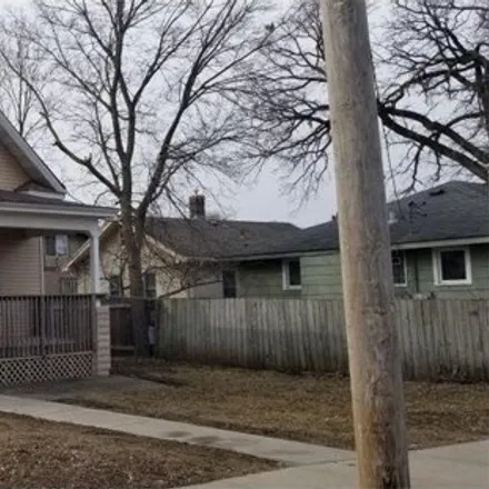 Buy this 5 bed house on 1411 North 24th Avenue in Minneapolis, MN 55411