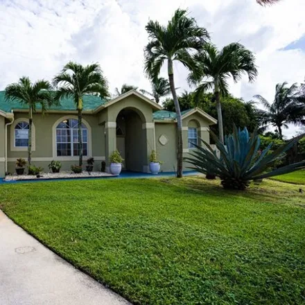Buy this 4 bed house on 132 Nottingham Road in West Palm Beach, FL 33411