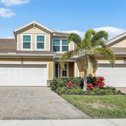 Rent this 4 bed townhouse on Arboretum Circle in Collier County, FL 33962