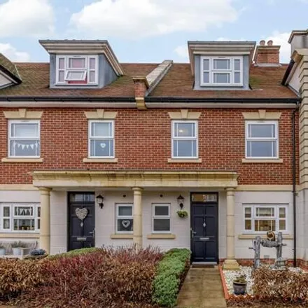 Rent this 3 bed townhouse on 16 Lawlor Close in Spelthorne, TW16 5BY