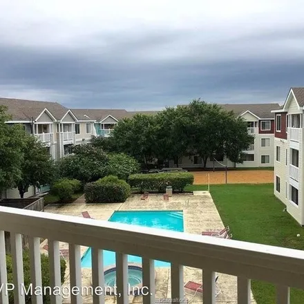 Rent this 4 bed condo on 519 Sw Pkwy Unit 104 in College Station, Texas