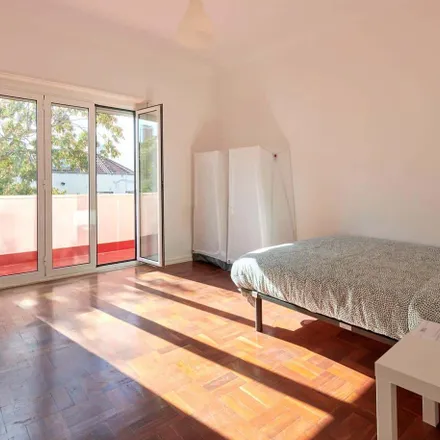 Rent this 14 bed room on Avenida Elias Garcia 48 in 1000-149 Lisbon, Portugal