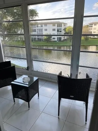 Rent this 2 bed condo on 1701 Andros Isle in Coconut Creek, FL 33066