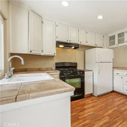 Buy this 2 bed condo on 11883 Fallingleaf Cir in Garden Grove, California