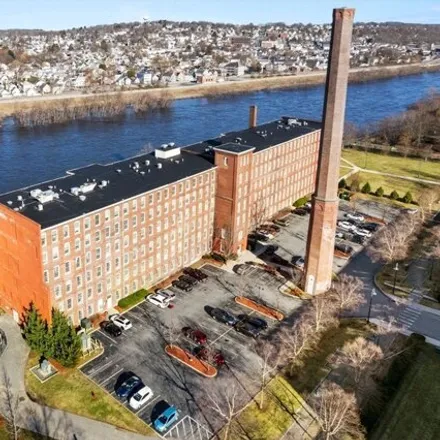 Buy this 2 bed condo on Lawrence Mills (historical) in Riverwalk, Lowell