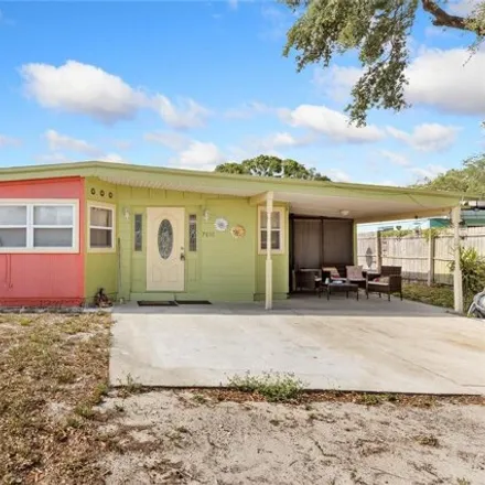 Buy this 4 bed house on 7876 Parish Place in Clair-Mel City, FL 33619