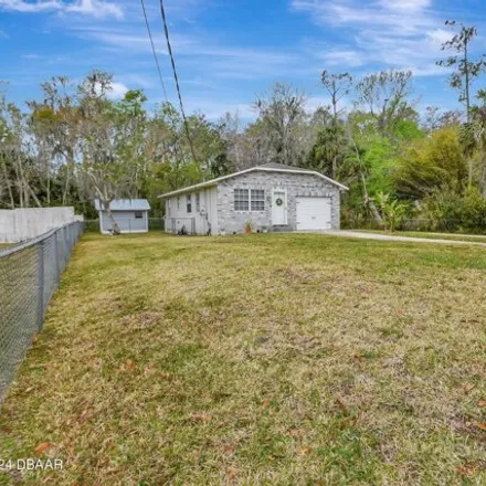 Buy this 2 bed house on 1180 Bolton Road in New Smyrna Beach, FL 32168