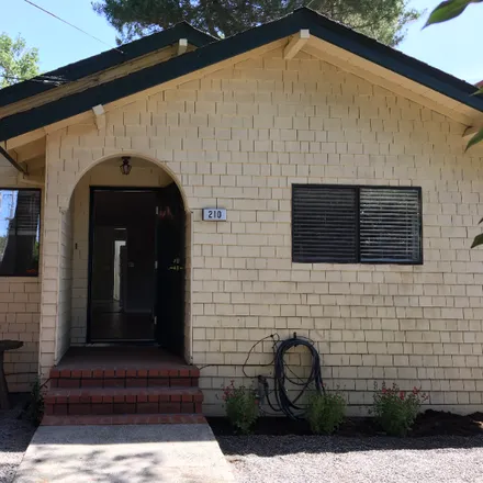 Rent this 2 bed house on 210 South E. St.