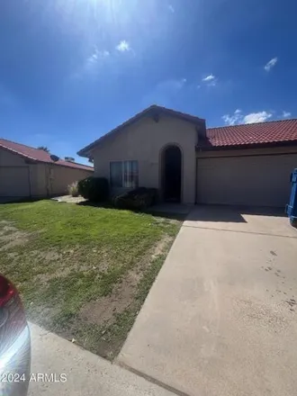 Rent this 3 bed house on 5249 East Tunder Circle in Phoenix, AZ 85044