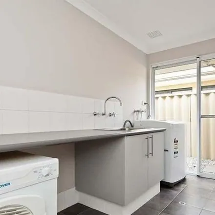 Rent this 4 bed apartment on 11 Carnaby Way in Harrisdale WA 6110, Australia