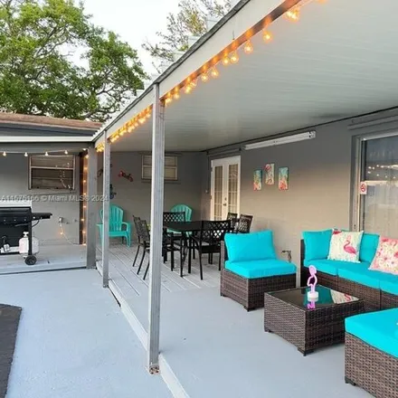 Buy this 4 bed house on 3402 South Longfellow Circle in West Hollywood, Hollywood