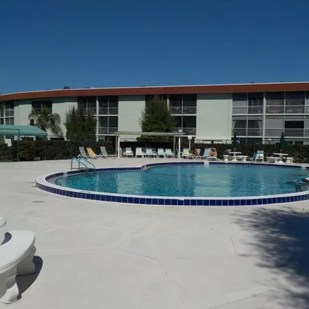 Rent this 2 bed apartment on 1999 Anderson Lane in Palm Springs, FL 33406