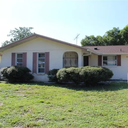 Buy this 2 bed house on 8222 Fox Hollow Drive in Jasmine Estates, FL 34668