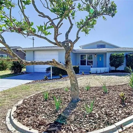 Buy this 4 bed house on 13276 Neptune Drive in Hudson, FL 34667