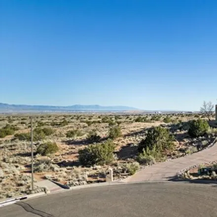 Buy this 4 bed house on 2473 Desert Marigold Road Northeast in Rio Rancho, NM 87144