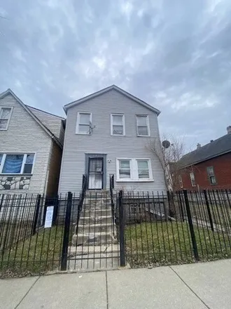 Buy this 4 bed house on 6447 South Eberhart Avenue in Chicago, IL 60637