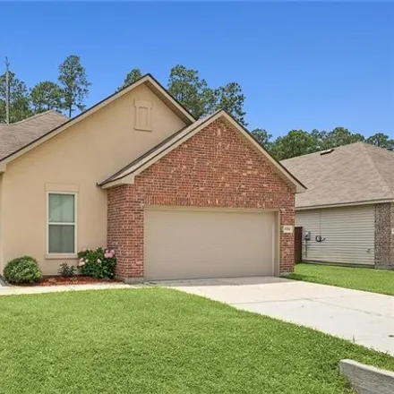 Rent this 4 bed house on 15556 Madris Ln in Covington, Louisiana