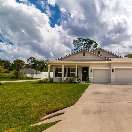 Buy this 4 bed house on 1 Smokewick Court in Palm Coast, FL 32164
