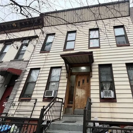 Buy this 12 bed house on 488 Onderdonk Avenue in New York, NY 11385