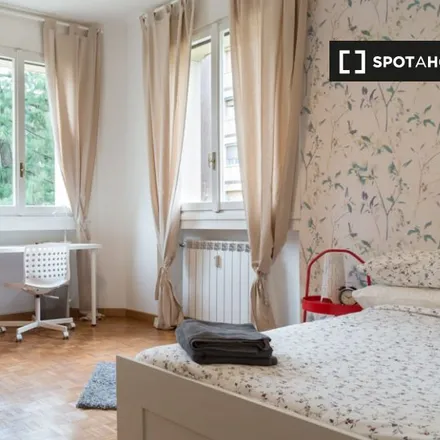 Rent this 3 bed room on Ottica dei Portici in Via Lorenteggio, 20146 Milan MI