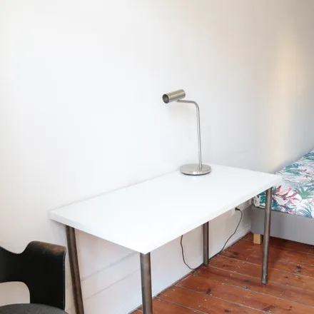 Rent this 6 bed room on Rua Alves Redol 3 in 1000-150 Lisbon, Portugal