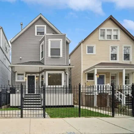Buy this 5 bed house on 1937 North Hamlin Avenue in Chicago, IL 60618