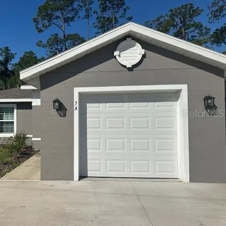 Rent this 3 bed house on 43 Llowick Court in Palm Coast, FL 32164