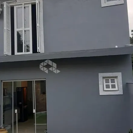 Buy this 3 bed house on Rua Adriano Pereira da Silva in Vila Nova, Porto Alegre - RS
