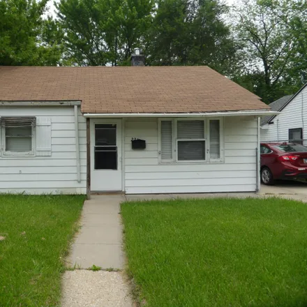 Buy this 4 bed house on 221 Vermont Avenue in Aurora, IL 60505