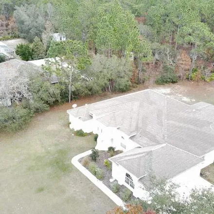 Rent this 4 bed apartment on 4039 North Pink Poppy Drive in Citrus County, FL 34465