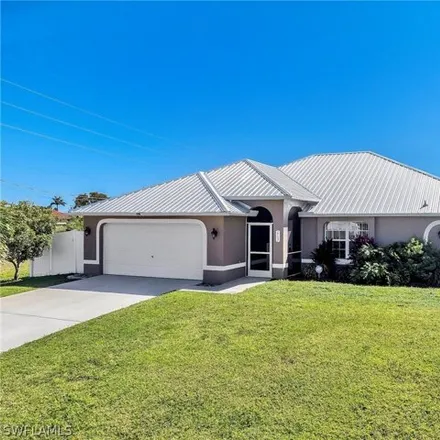 Buy this 4 bed house on 2690 Northeast 5th Place in Cape Coral, FL 33909