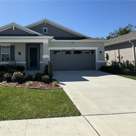 Rent this 4 bed house on 5058 Meadow Song Drive in Leesburg, FL 34762