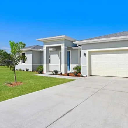 Buy this 4 bed house on 1665 Tilly Street Southeast in Palm Bay, FL 32909