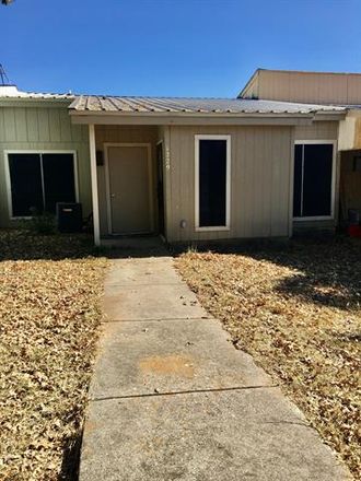 Rent this 2 bed townhouse on 1229 Elm Court in Runaway Bay, TX 76426