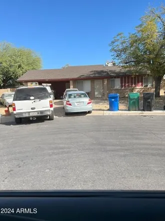 Buy this 3 bed house on 501 South Glennwood Circle in Mesa, AZ 85204