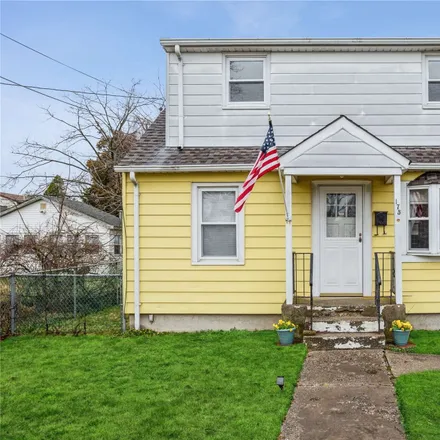 Buy this 4 bed house on 175 Smith Street in East Patchogue, NY 11772