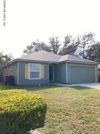 Rent this 3 bed house on 5502 Oak Crossing Drive in Jacksonville, FL 32244