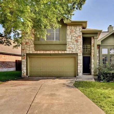 Rent this 4 bed house on 7168 Ridge Oak Road in Austin, TX 78749