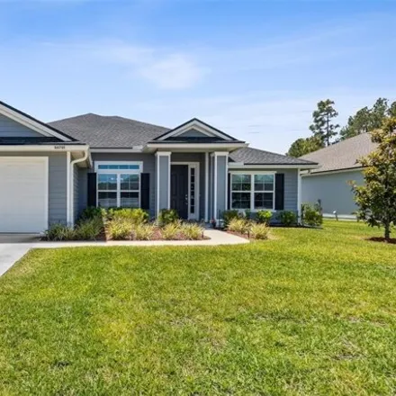 Buy this 4 bed house on 86701 Lazy Lake Cir in Yulee, Florida