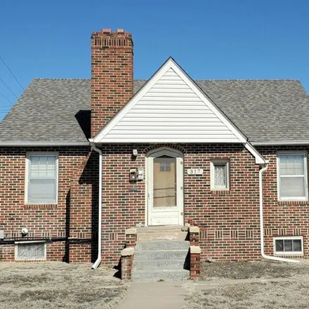 Buy this 4 bed house on Developmental Services of Northwest Kansas in Walnut Street, Hays