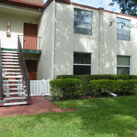 Rent this 2 bed condo on 15 Willowbrook Ln Apt 108 in Delray Beach, Florida